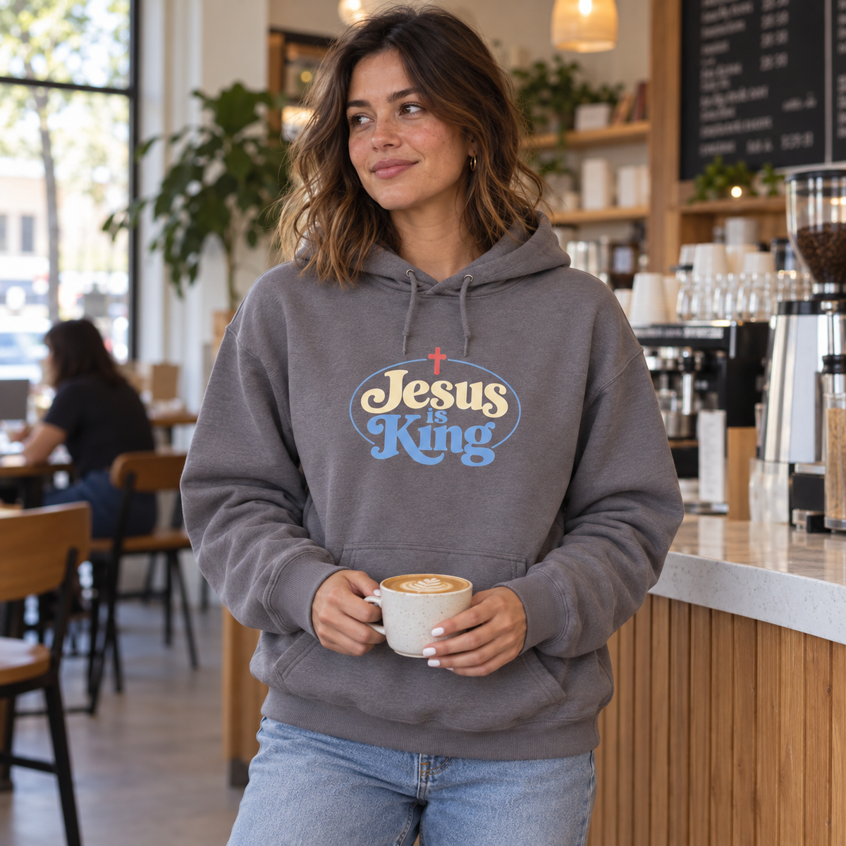 Jesus Is King Champion Hoodie | Philippians 2:10–11