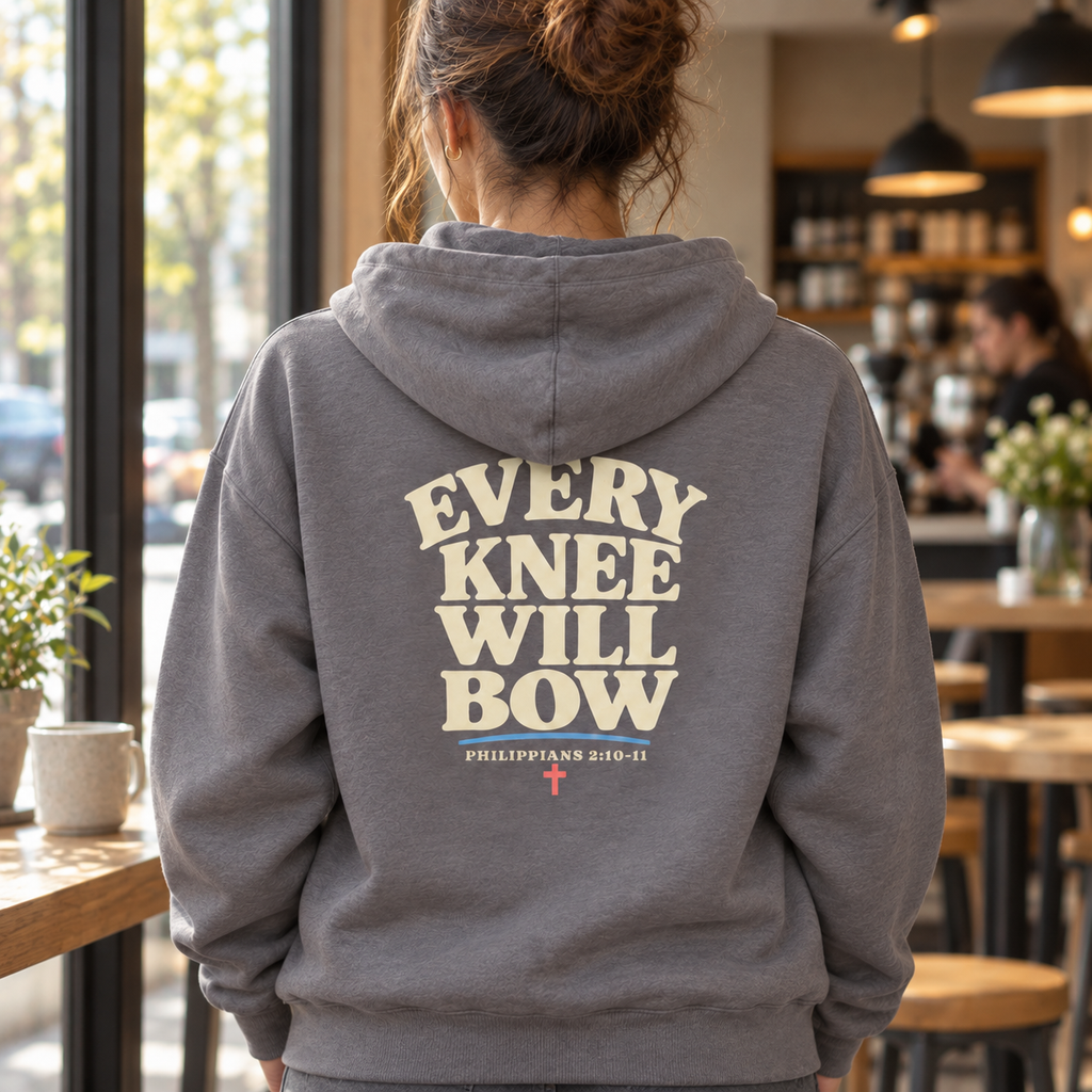 Jesus Is King Champion Hoodie | Philippians 2:10–11